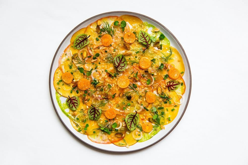 Florie’s Heirloom Tomato & Peach Carpaccio 1 Florie’s Heirloom Tomato & Peach Carpaccio - Courtesy Emily Hawkes Photography