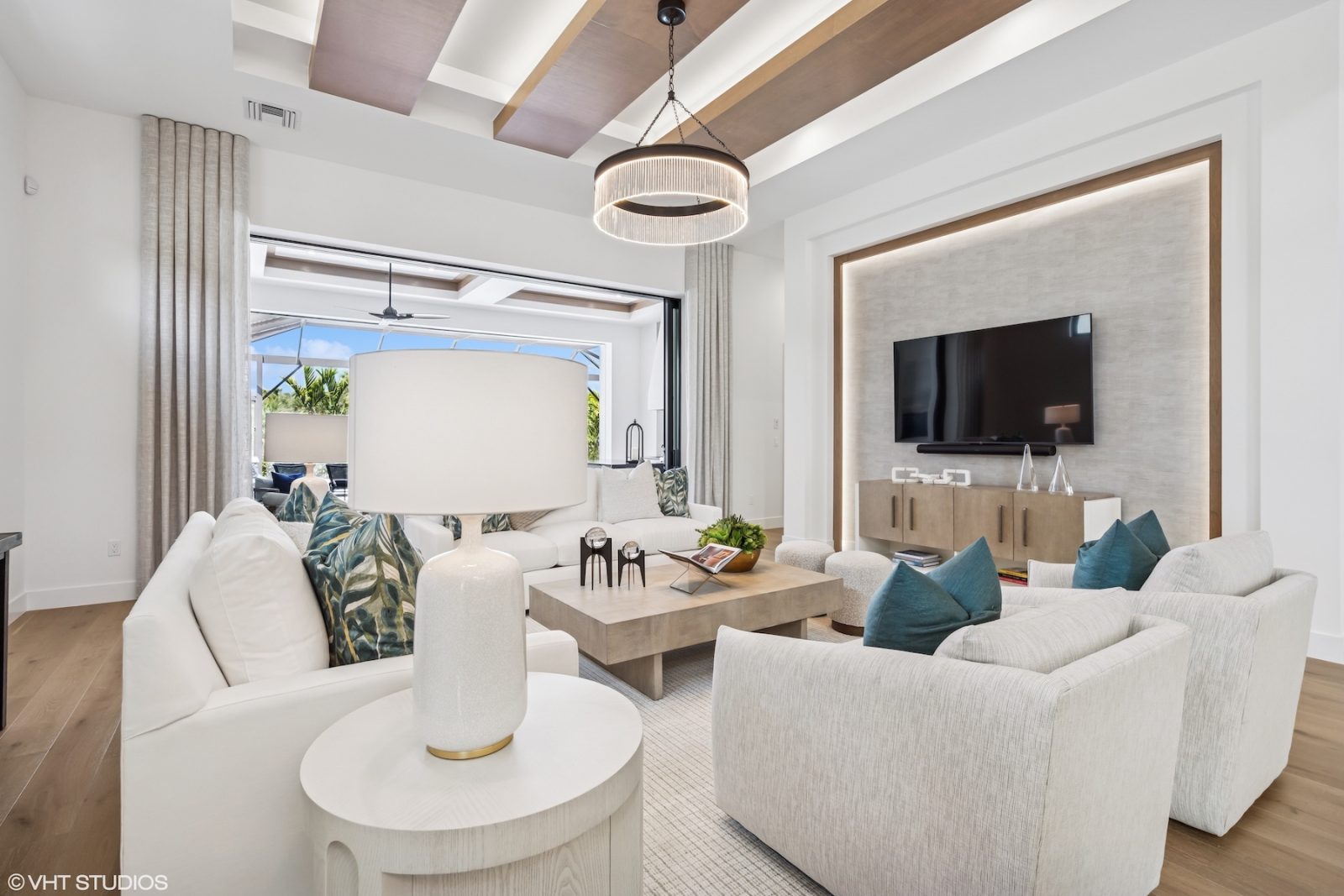 The Ashton at Miromar Lakes - coastal design entertainment area