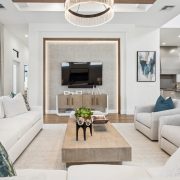 The Ashton at Miromar Lakes - blue grey coast living room, entertainemnt area