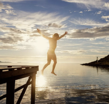 Up Norway - jumping off a dock in Norway at sunset