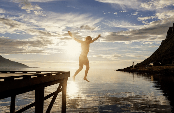 Up Norway - jumping off a dock in Norway at sunset