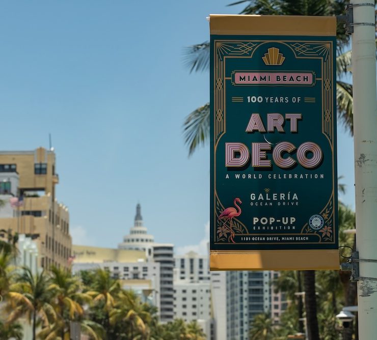 Miami Beach Art Deco banner promoting 100 years of Art Deco architecture during Fall for the Arts cultural season.