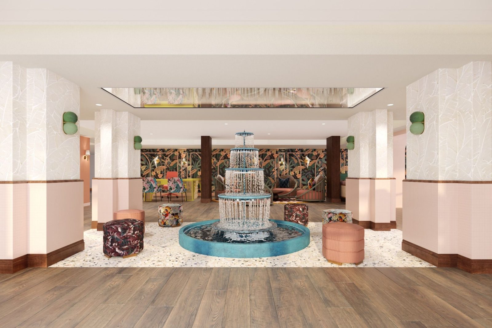 Redesigned lobby at Ocean Key Resort & Spa featuring a sculptural fountain, tropical décor, and pastel tones inspired by Key West.