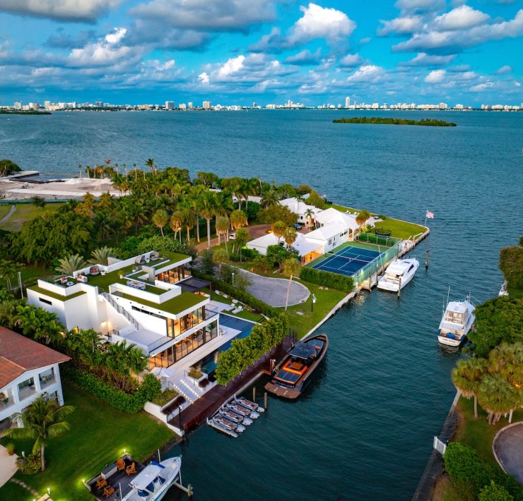 Aerial view of Casa Moderne in Bay Point, Miami, showcasing its waterfront location, private dock, and panoramic Biscayne Bay views.