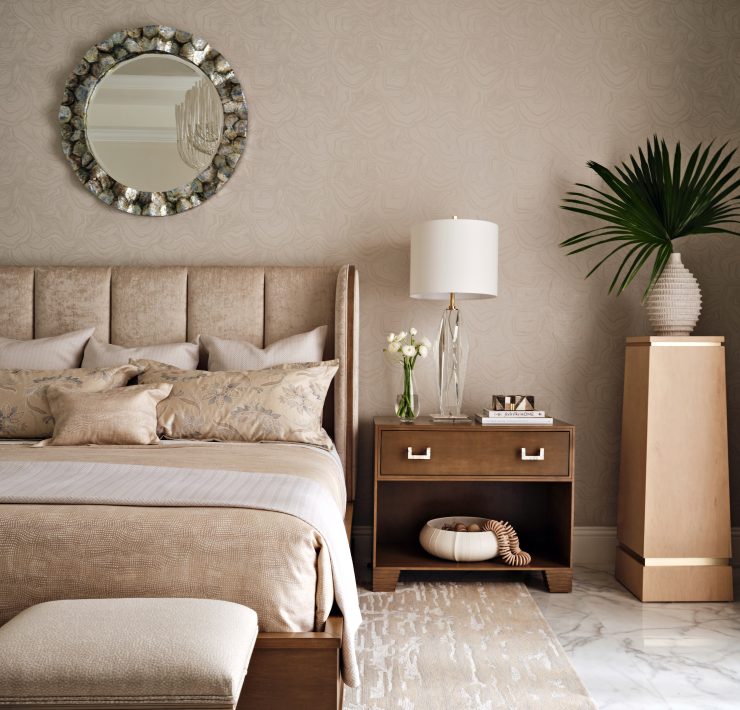 Sophisticated primary bedroom with tufted headboard, neutral palette, and elegant layered textures by Maritza Capiro.