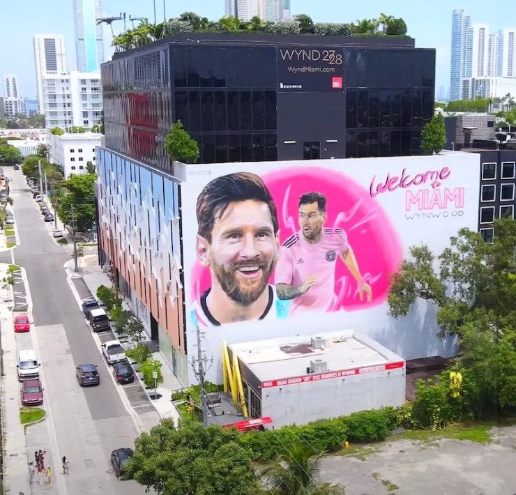 Aerial view of Wynwood district with Messi mural and colorful street art in Miami.