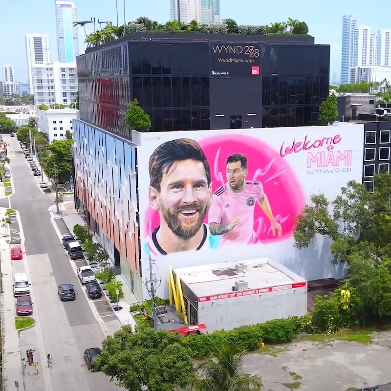 Aerial view of Wynwood district with Messi mural and colorful street art in Miami.