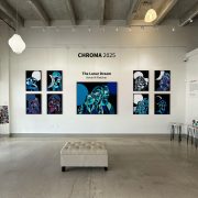Interior of Lucid Design District gallery during CHROMA 2025 exhibition, showcasing international contemporary artworks.