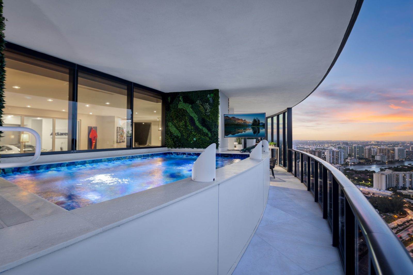Porsche Design Tower Penthouse 4405 featuring a private infinity pool with panoramic ocean views and modern architectural design.
