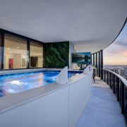 Porsche Design Tower Penthouse 4405 featuring a private infinity pool with panoramic ocean views and modern architectural design.