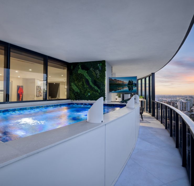 Porsche Design Tower Penthouse 4405 featuring a private infinity pool with panoramic ocean views and modern architectural design.