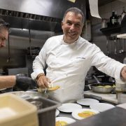 Chef Claudio Lobina preparing gourmet Mediterranean dishes at The Patio restaurant, Continuum Miami Beach.