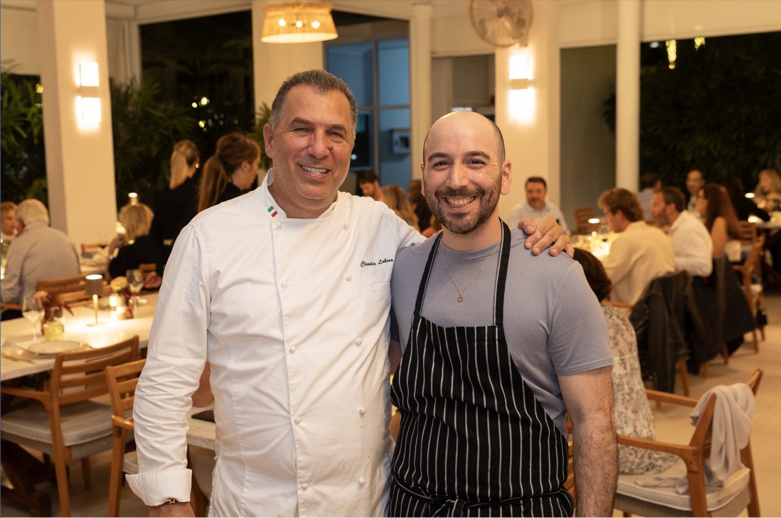Chefs Claudio Lobina and Sam Levenfeld collaborating during the Continuum and K’Far culinary event in Miami Beach.