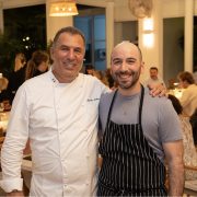 Chefs Claudio Lobina and Sam Levenfeld collaborating during the Continuum and K’Far culinary event in Miami Beach.