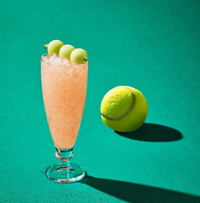 Honey Deuce cocktail at Mama Tried Miami, featuring melon-infused Grey Goose, citrus, and honeydew balls inspired by the US Open.