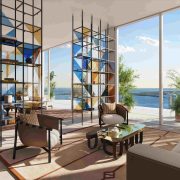 Living room at JEM Sky Villa featuring ocean views and the FENDI Casa Matrice bookcase in a modern open layout.