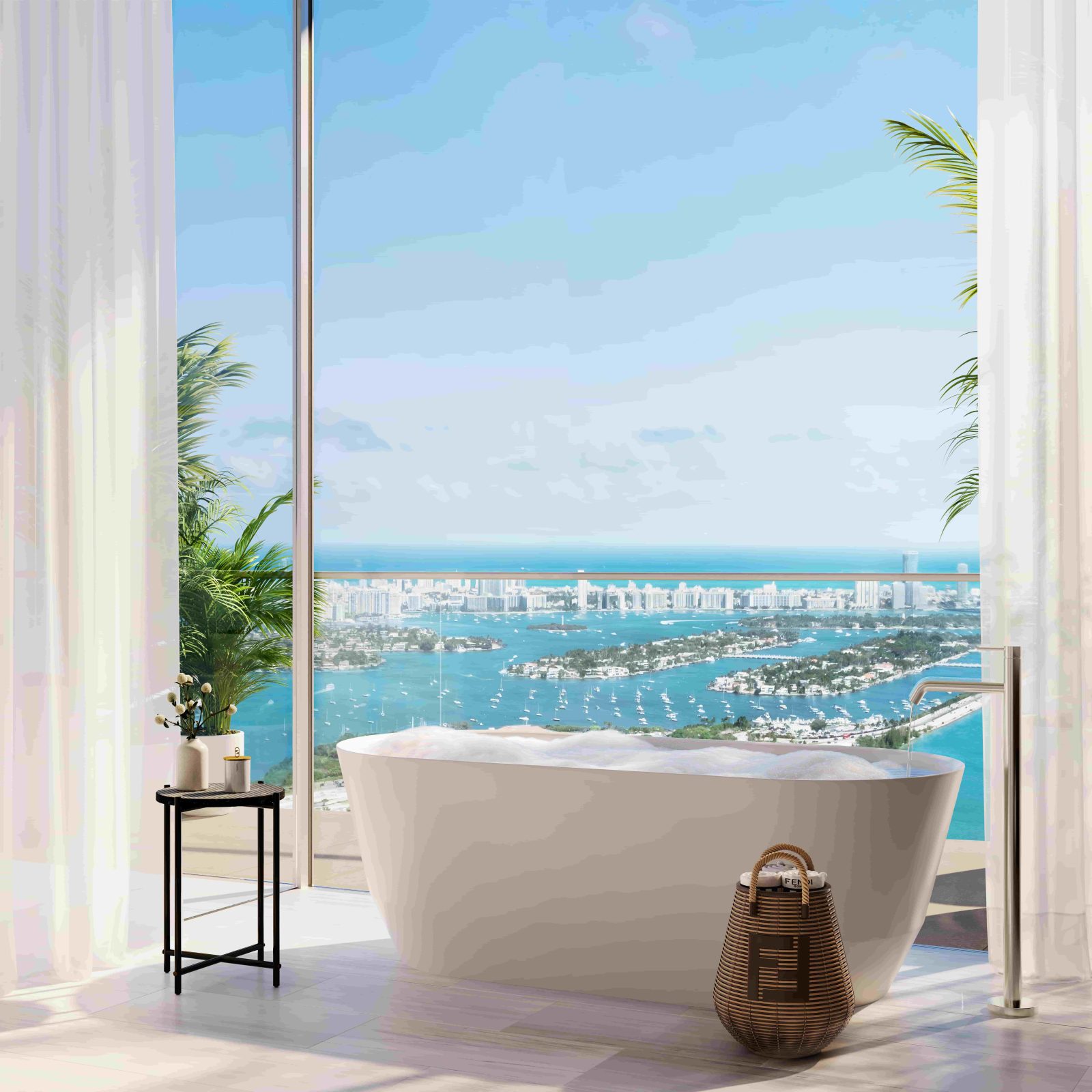 Luxury bathroom with freestanding tub and expansive skyline and bay views at JEM Sky Villa in Miami.