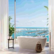 Luxury bathroom with freestanding tub and expansive skyline and bay views at JEM Sky Villa in Miami.