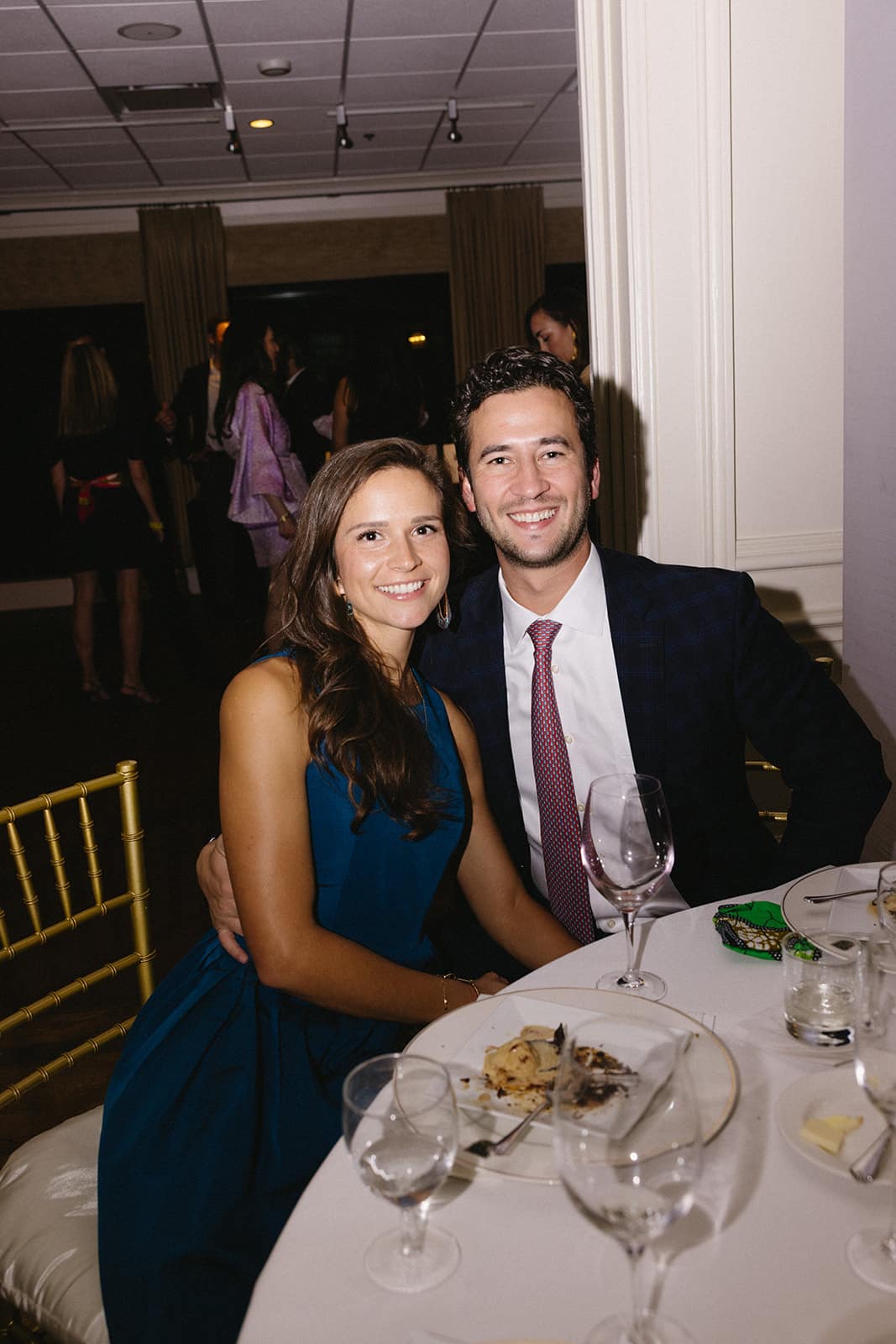 Attendees enjoying dinner and conversation during the Both Ends Believing “Around the World” fundraising gala.