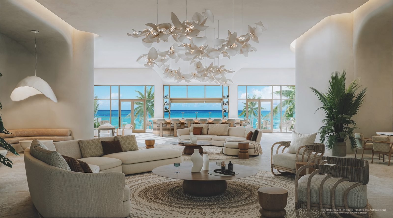 Luxury living room with panoramic ocean views and natural light at Nikki Beach Residences Antigua.