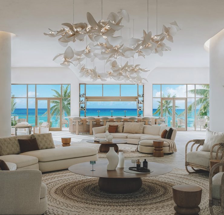 Luxury living room with panoramic ocean views and natural light at Nikki Beach Residences Antigua.