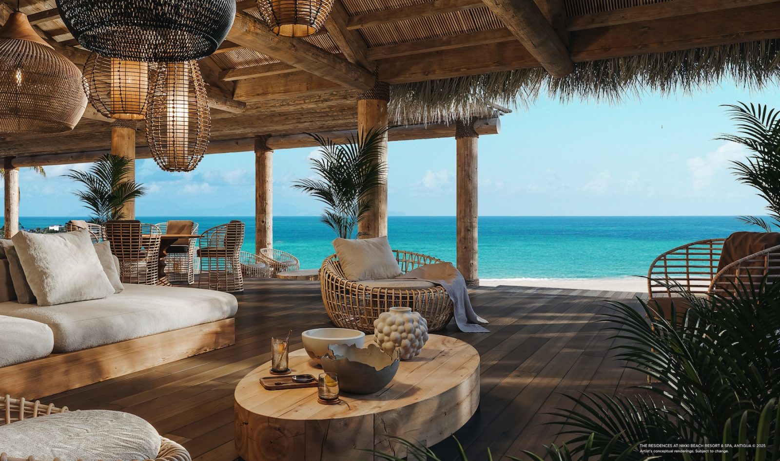 Oceanfront terrace with natural wood design and sea views at The Residences at Nikki Beach Resort & Spa Antigua.