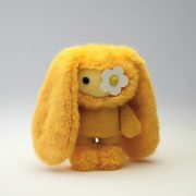 Yellow juju collectible by Cj Hendry for Phillips Hong Kong art toy collection