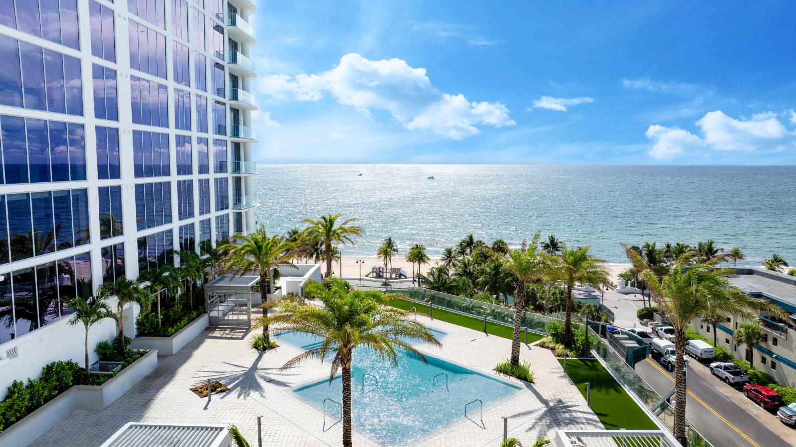Selene Oceanfront Residences pool terrace overlooking Fort Lauderdale Beach and the Atlantic Ocean.