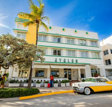 Facade of Avalon Hotel South Beach Miami with vintage car