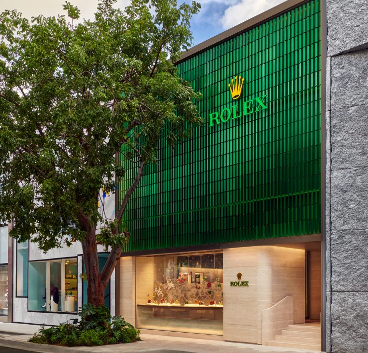 Exterior of Luxury Swiss Boutique’s two-level showroom in Miami Design District with signature green façade
