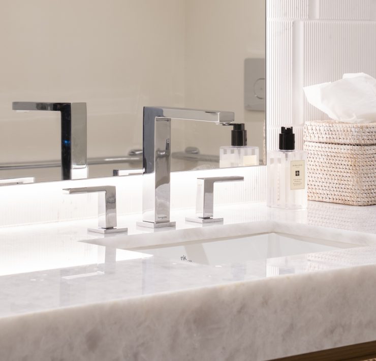 Sleek stone counters at the Glass House Boca Raton sales gallery