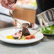 chef todd english prepares lamb chops dinner2
