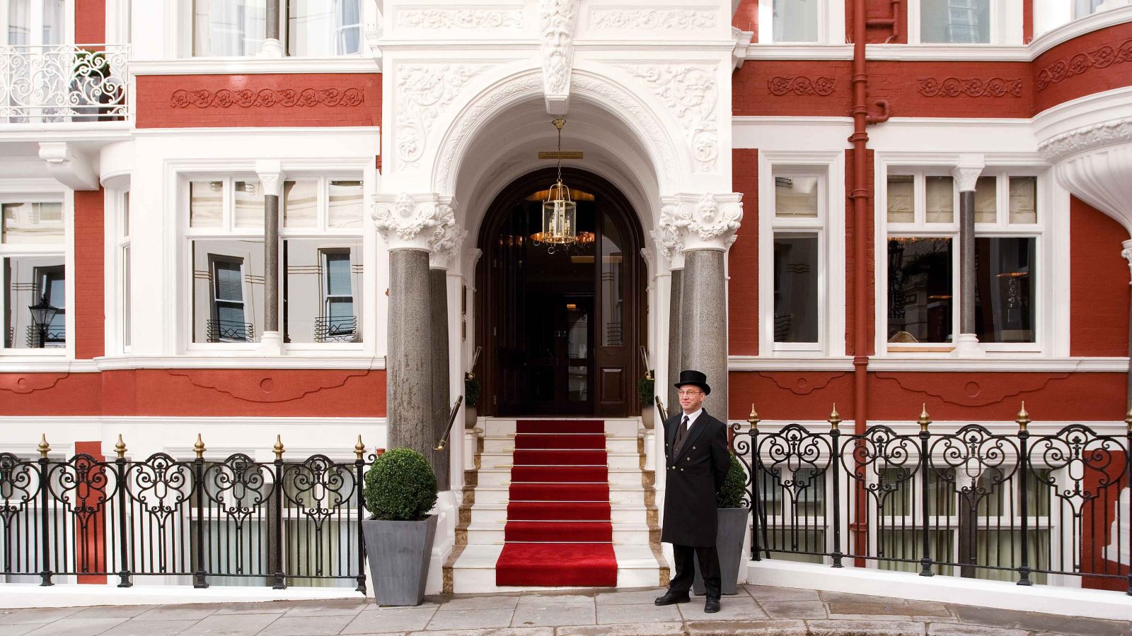 a porter outside the st. jamess hotel and club photo courtesy of st. jamess hotel and club