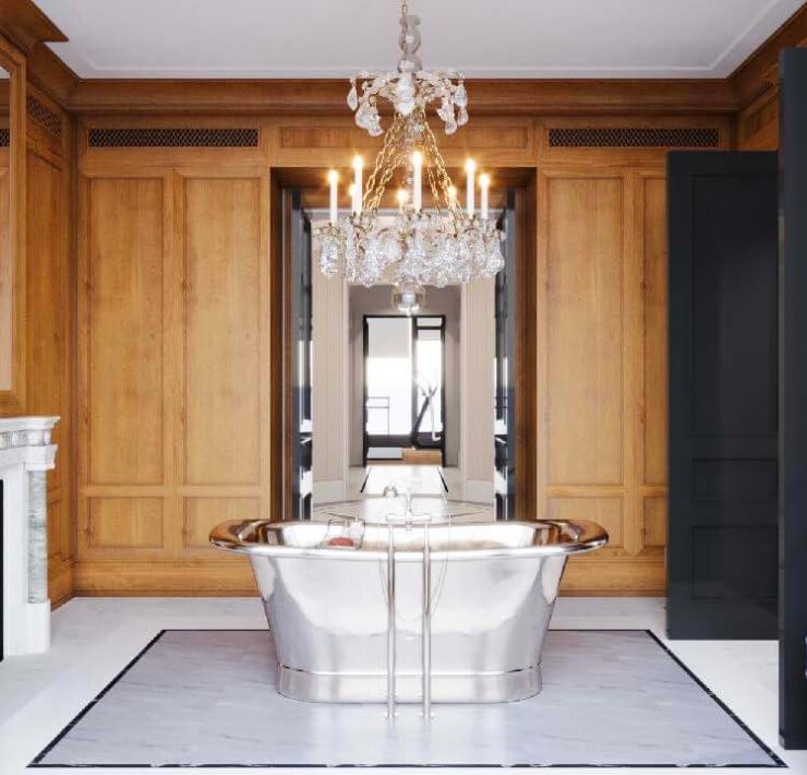 Classic bathroom with freestanding metal tub, marble fireplace, crystal chandelier, and rich wood wall paneling
