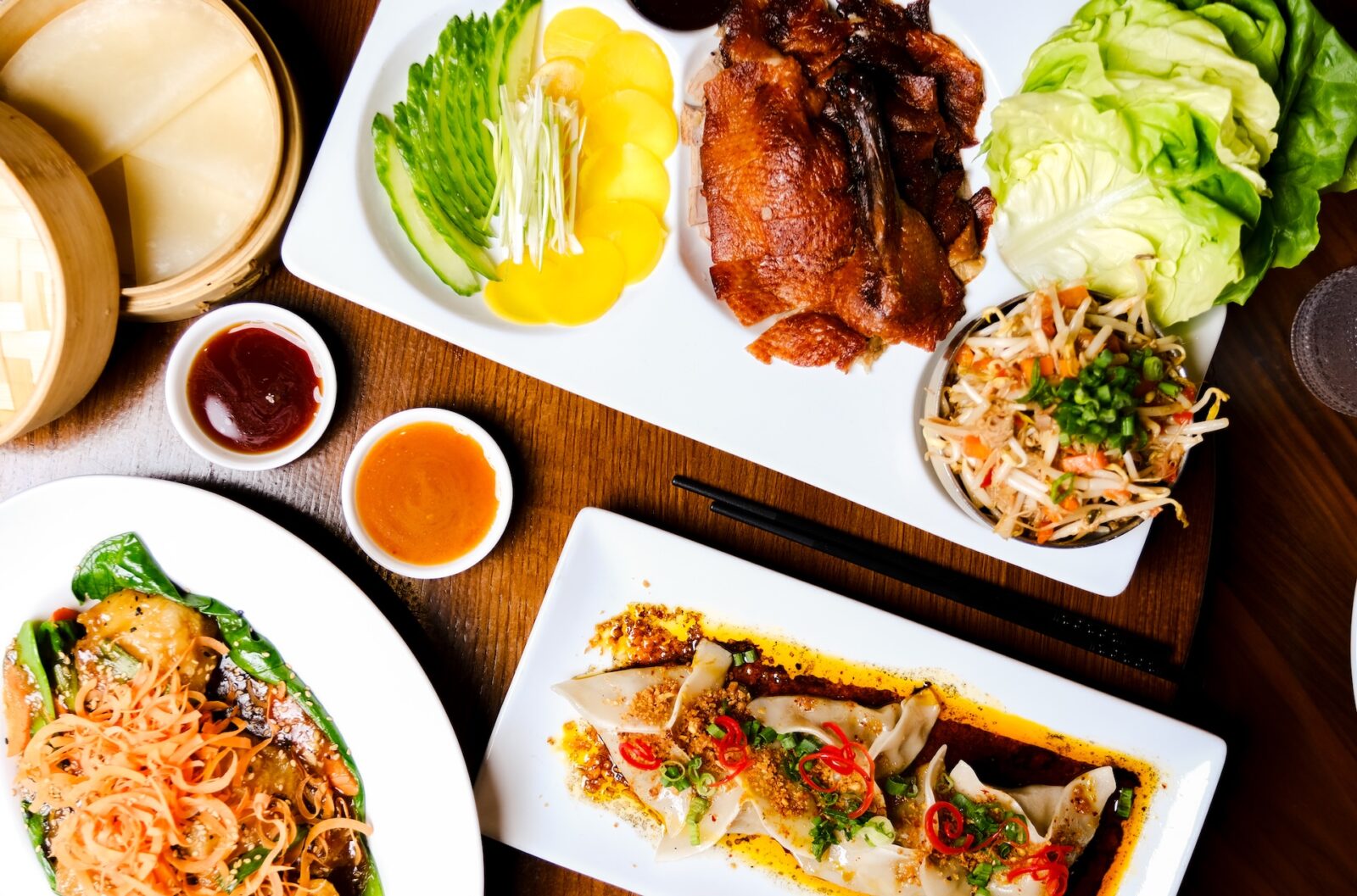 red pine half roasted duck peking lettuce cups chilean sea bass and wagyu beef dumplings