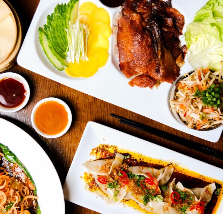 red pine half roasted duck peking lettuce cups chilean sea bass and wagyu beef dumplings