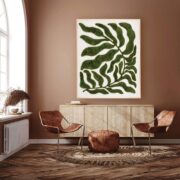 Moss botanical wall art above a console in a warm, natural interior design setting