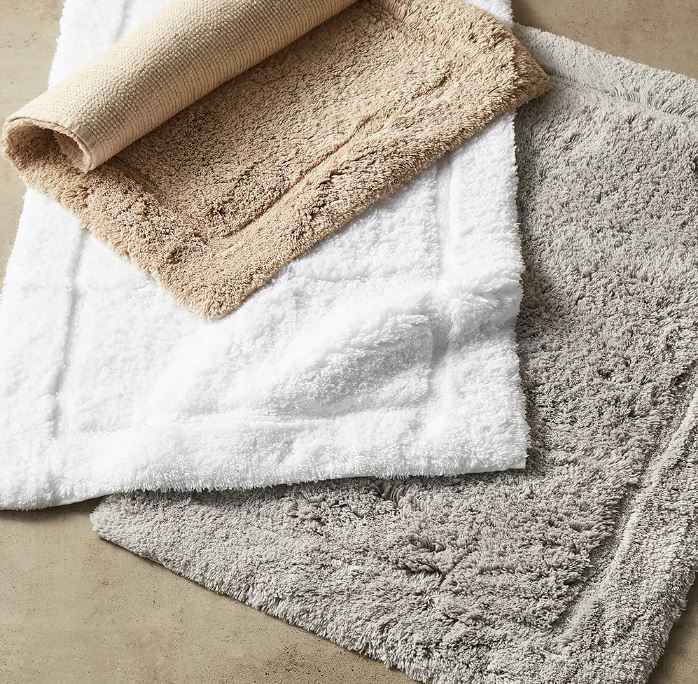 Trousseau Must Bath Rug collection in white, beige, and grey with plush textured cotton pile