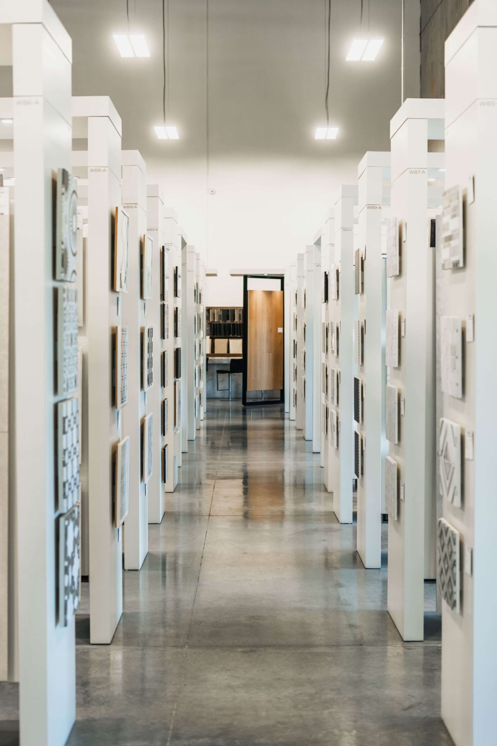 Opustone West Palm Beach tile gallery with rows of stone, porcelain, and decorative surface samples for design projects