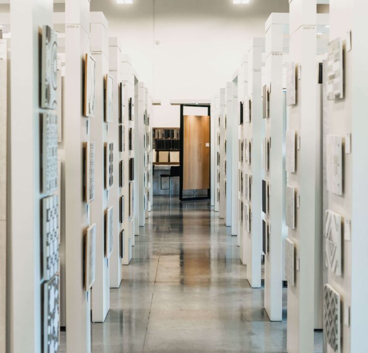 Opustone West Palm Beach tile gallery with rows of stone, porcelain, and decorative surface samples for design projects