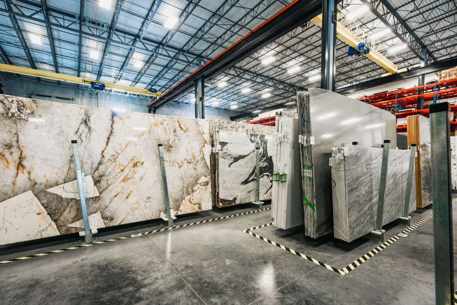 Opustone natural stone slab warehouse with marble, quartzite, and large-format surfaces for luxury residential design