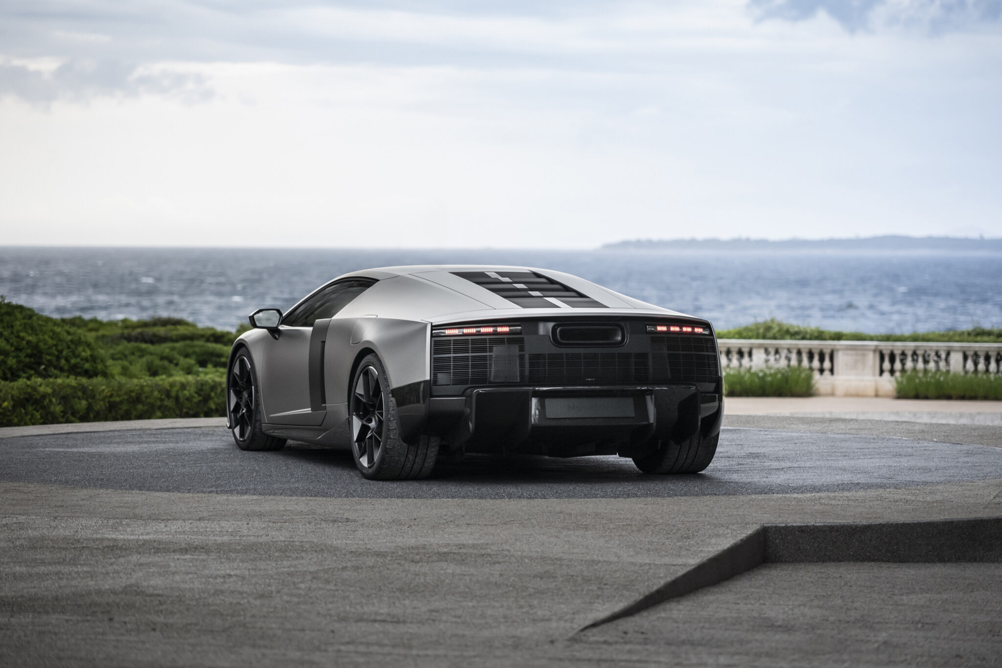 audi nuvolariTitanium, outdoor static photo, exterior, rear three-quarter view