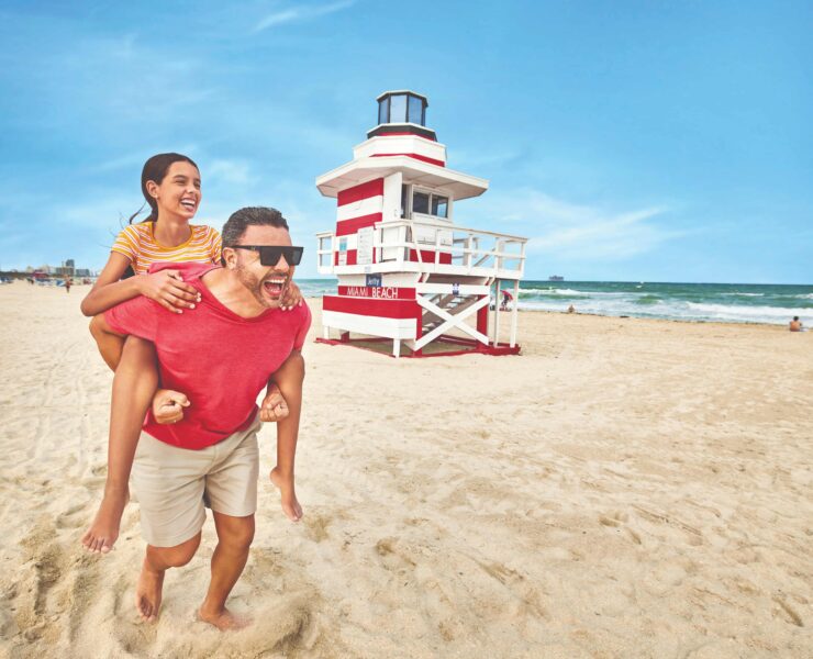 family photo with tower beachfront south beach credit gmcvb