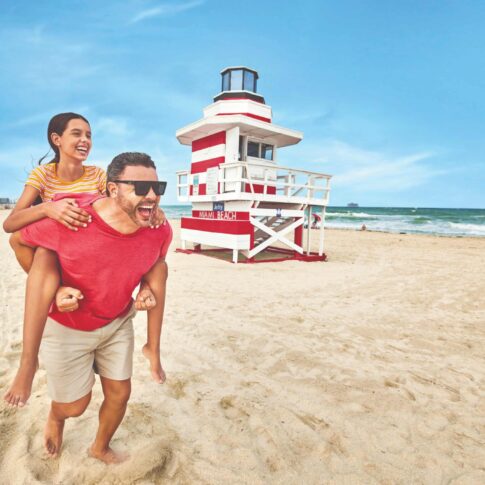 family photo with tower beachfront south beach credit gmcvb