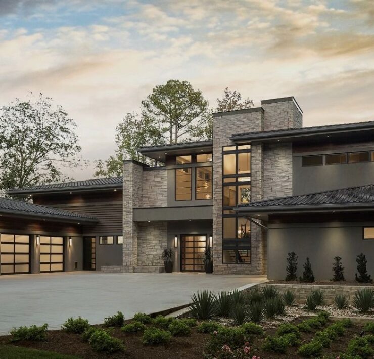 Modern luxury home exterior with integrated smart home lighting and automation by Sound & Vision Technology
