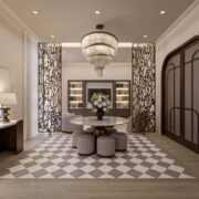 Trazzo elegant foyer chandelier lighting with decorative screens, recessed ceiling lights, and warm architectural lighting design.