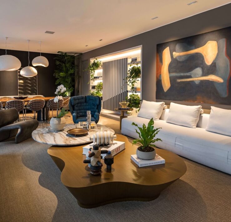 Trazzo luxury lounge lighting design with pendant lighting, art lighting, recessed ceiling lights, and warm residential interior illumination.