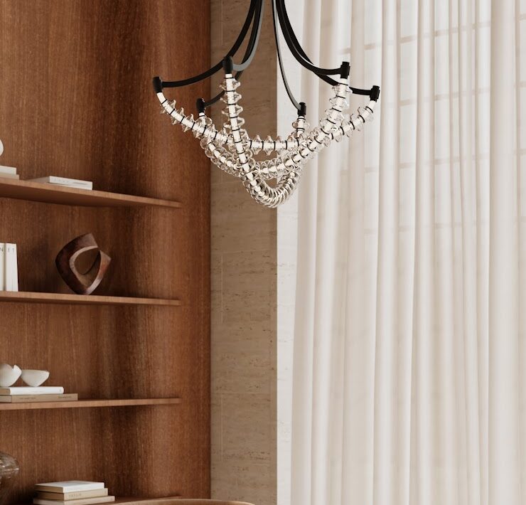 Minka Pearl abstract chandelier with glass detailing in a warm interior with wood shelving, soft curtains, and lounge seating.