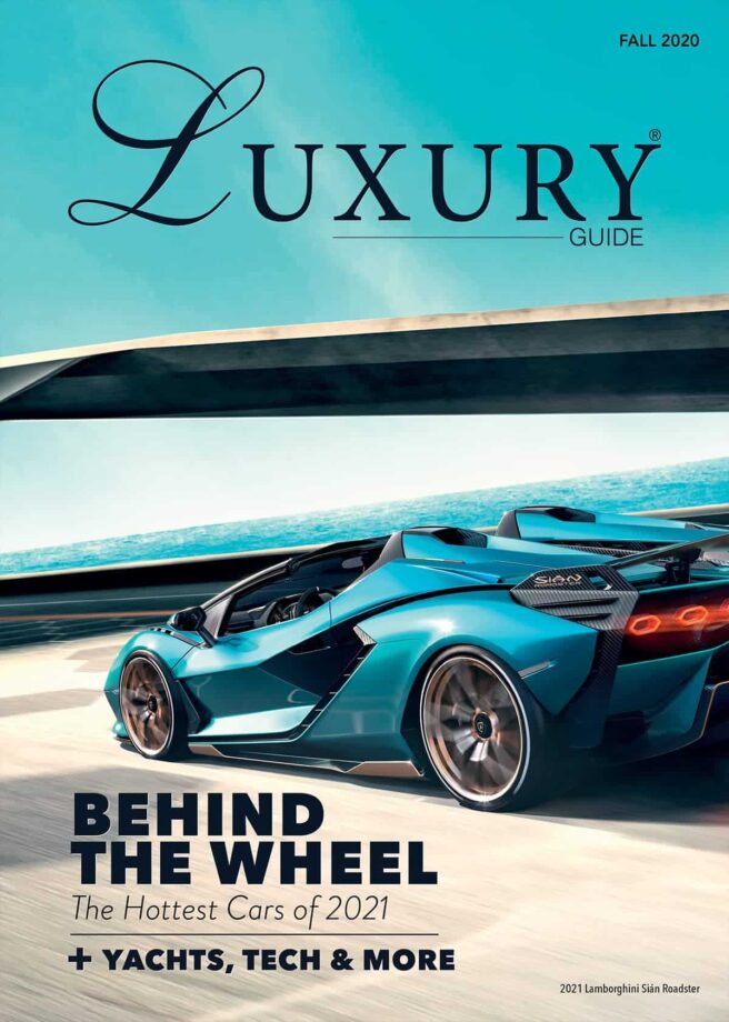 Luxury Guide Cover Fall 2020 Luxury Guide Fall 2020 cover featuring a turquoise Lamborghini Sián Roadster driving beside the ocean.