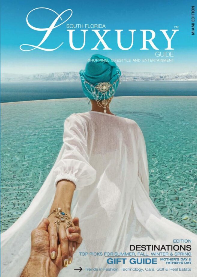 Luxury Guide Cover May-June 2016 South Florida Luxury Guide Miami cover featuring a woman in a white resort dress and turquoise headwrap holding someone’s hand beside an infinity pool overlooking the sea.